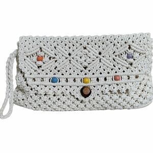 Woven beaded clutch wristlet